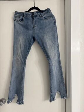 Light Blue Distressed Flare Jeans with Pearl Trim
